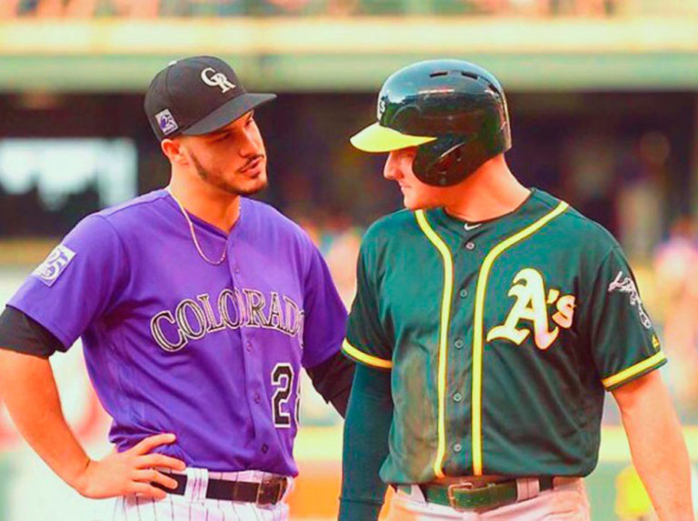 Chapman y Arenado ganan Guante de Platino